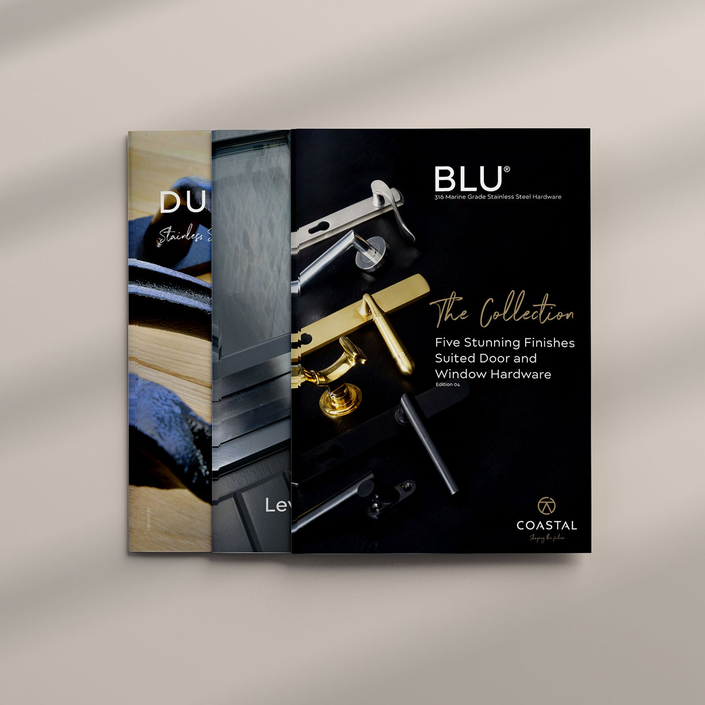 Coastal Group's BLU door and window hardware collection brochure on a light grey background