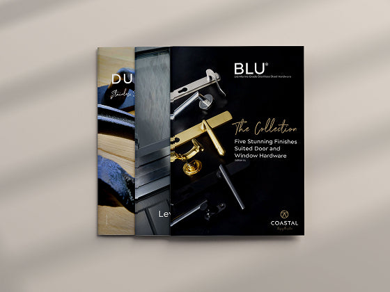 Coastal Group brochures featuring door and window hardware on a grey background